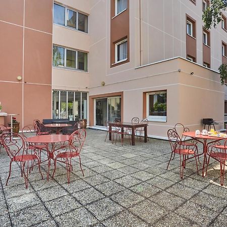 Hotel Cinepole - Proche Paris 儒安维尔·勒·彭特 外观 照片